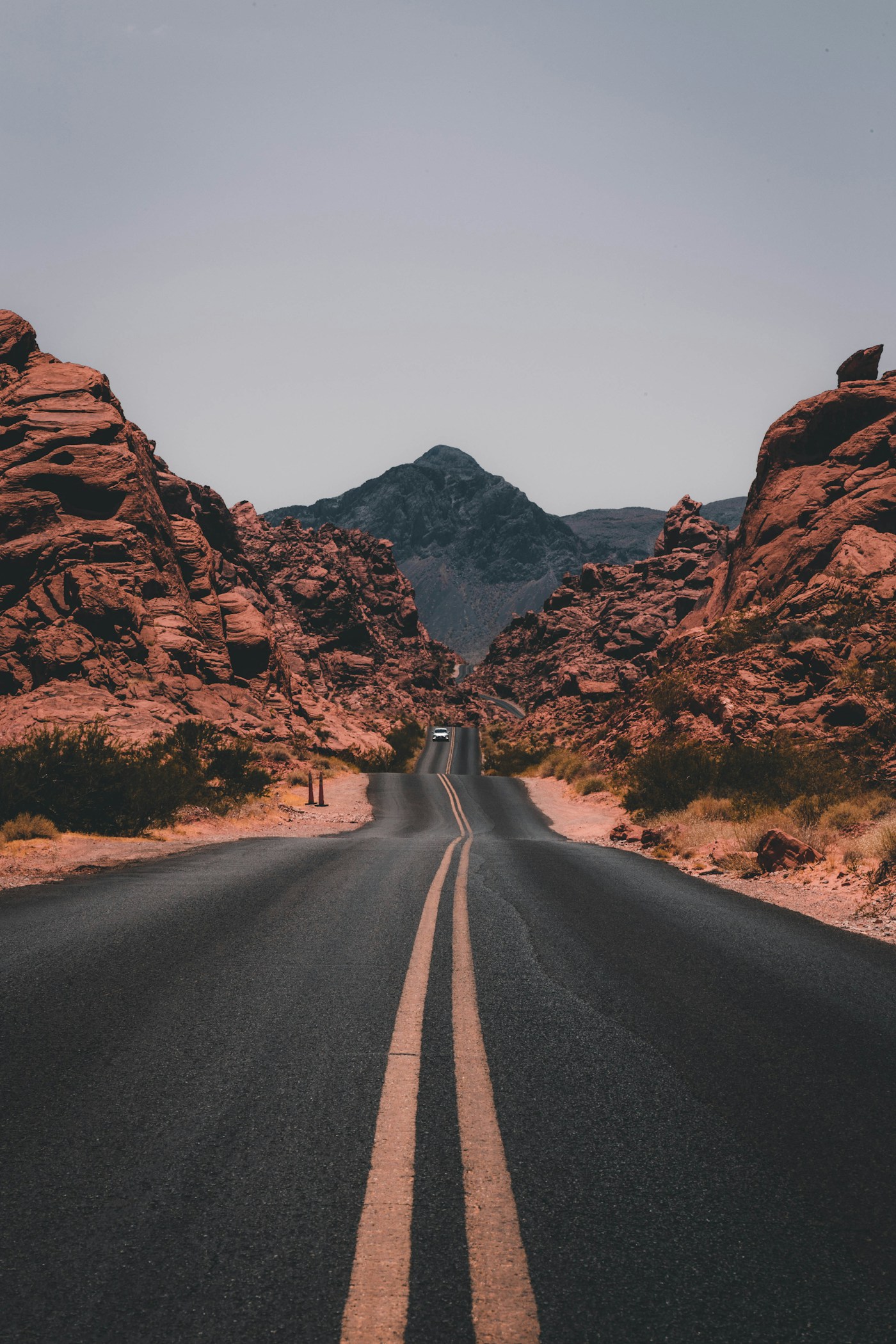Open road through a mountain landscape