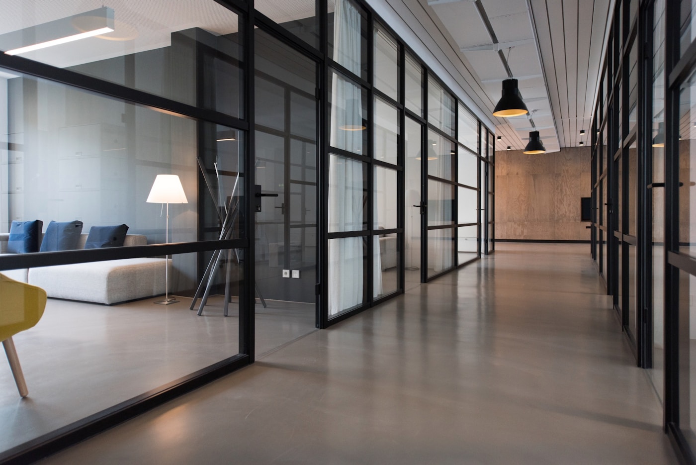 Bright creative workspace with glass walls